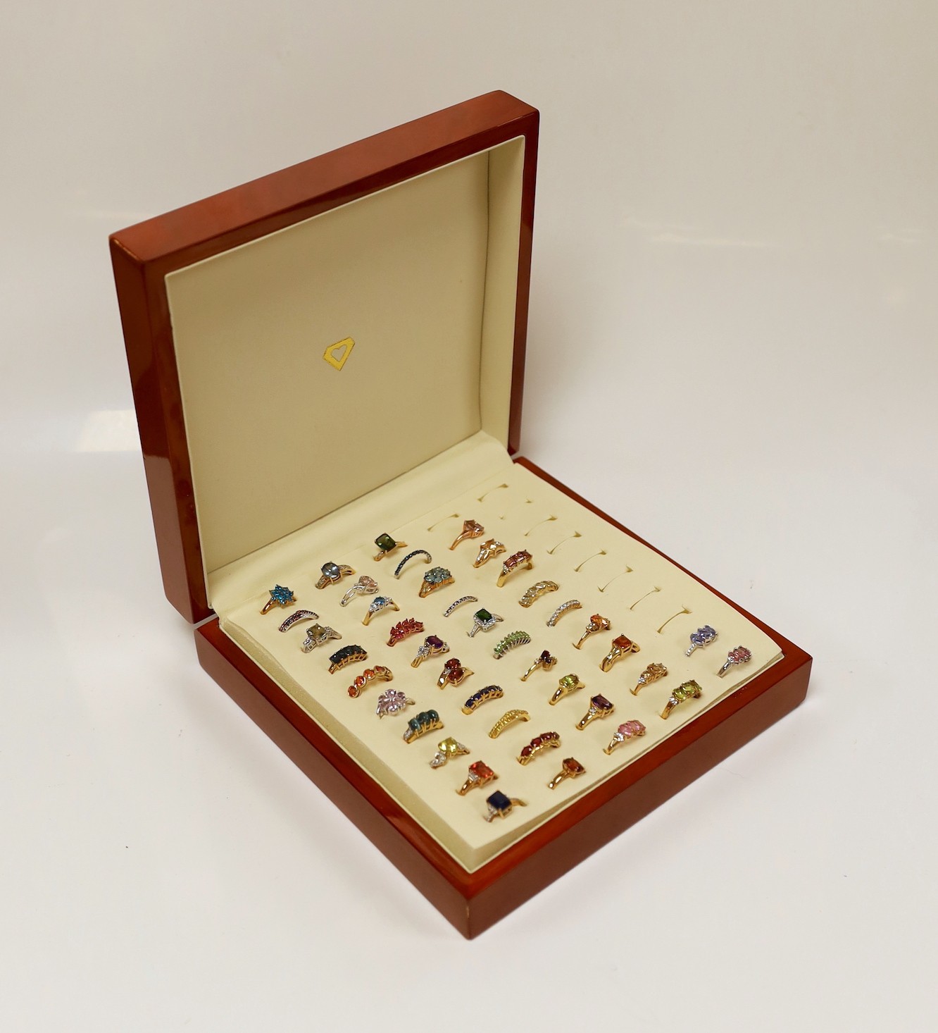 Thirty nine assorted modern 9ct gold and gem set dress rings, including amethyst and garnet and two 18ct gold and gem set rings, in ring box.